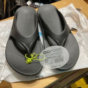 Oofos flip flops